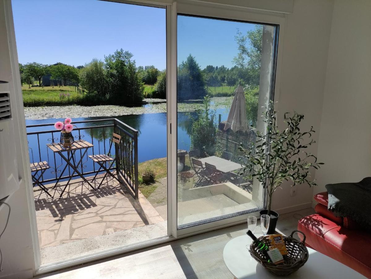 Détente au bord du Loir - Gîte 2 Les Roches-l'Eveque Extérieur photo